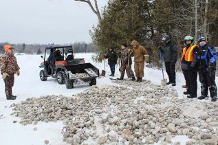 The rocks were deposited off two different islands (known walleye spawning beds) on the ice and will to the bottom when the ice melts in the spring.